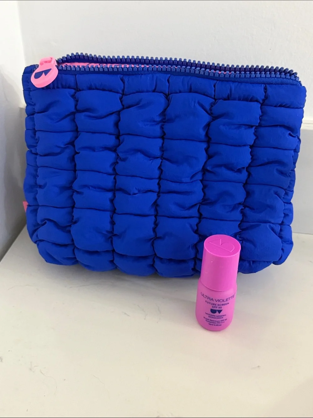 Sephora x Ultra Violette puffer cosmetic bag & sunscreen